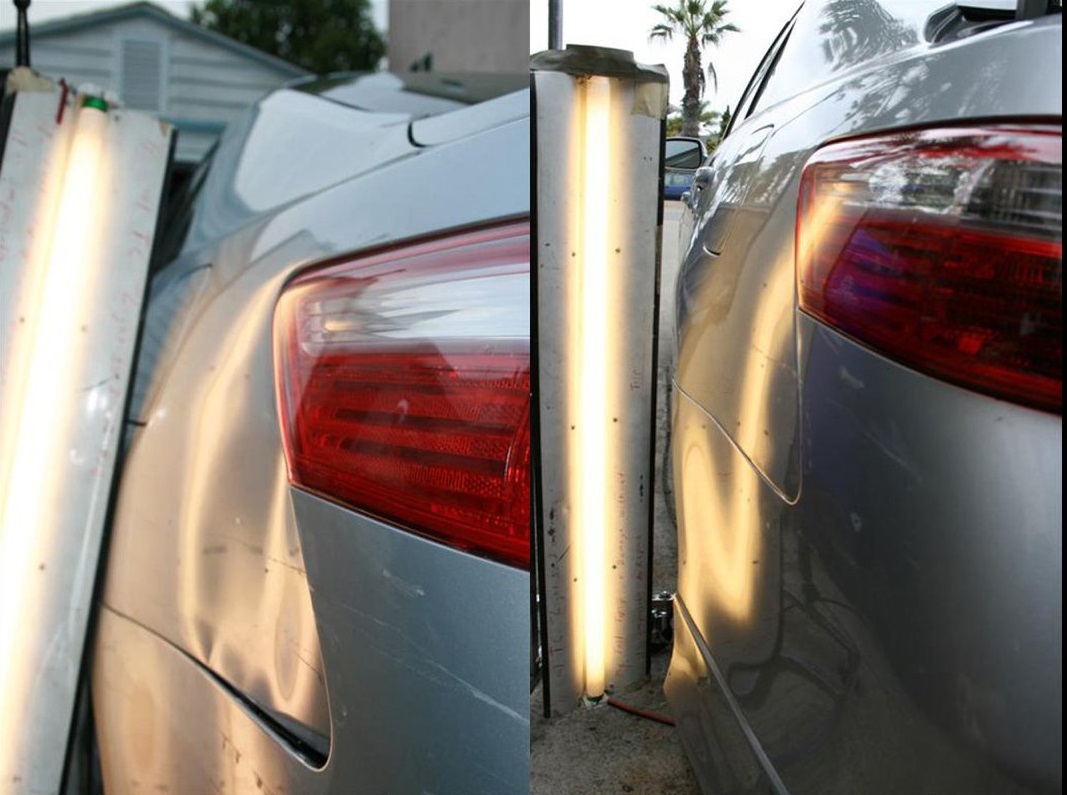 A car with the front end half-torn off and the rear half-dented.