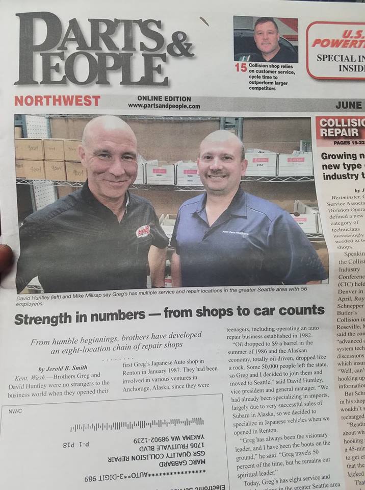 A newspaper with an article about two men.