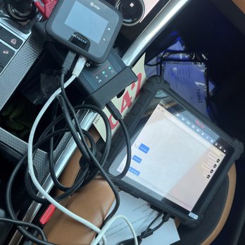 A table with many different devices plugged in